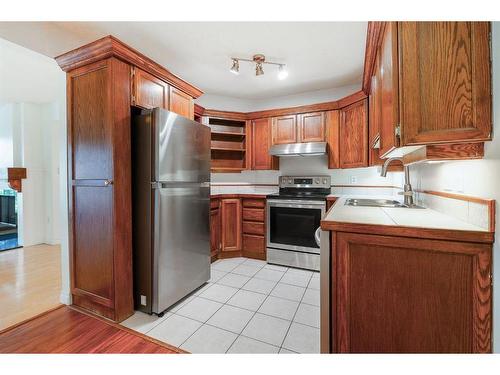 309-2611 1 Avenue Nw, Calgary, AB - Indoor Photo Showing Kitchen With Double Sink