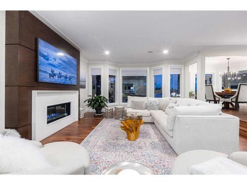 57 Mckenzie Lake Point Se, Calgary, AB - Indoor Photo Showing Living Room With Fireplace