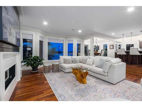 57 Mckenzie Lake Point Se, Calgary, AB - Indoor Photo Showing Living Room With Fireplace