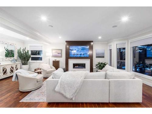 57 Mckenzie Lake Point Se, Calgary, AB - Indoor Photo Showing Living Room With Fireplace