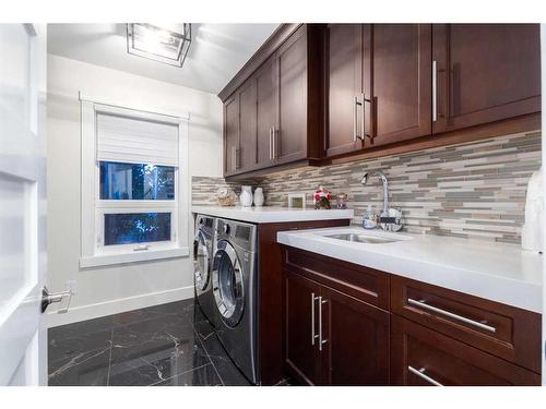 57 Mckenzie Lake Point Se, Calgary, AB - Indoor Photo Showing Laundry Room