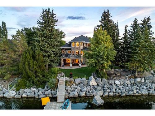 57 Mckenzie Lake Point Se, Calgary, AB - Outdoor With Body Of Water