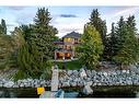 57 Mckenzie Lake Point Se, Calgary, AB  - Outdoor With Body Of Water 