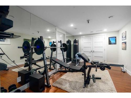 57 Mckenzie Lake Point Se, Calgary, AB - Indoor Photo Showing Gym Room