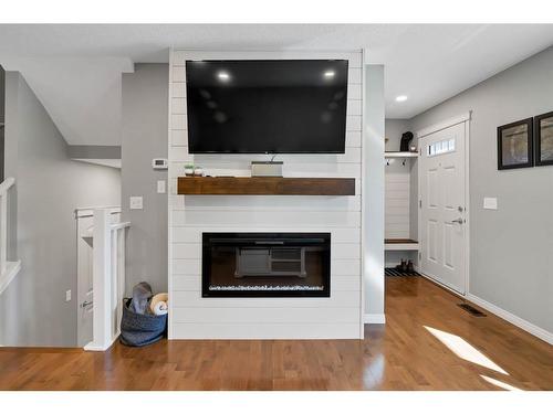 129 Chaparral Valley Drive Se, Calgary, AB - Indoor Photo Showing Living Room With Fireplace