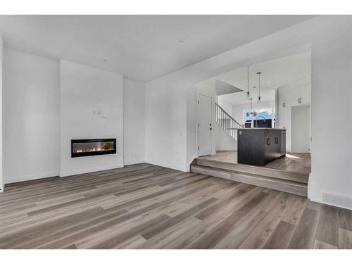 46 Herron Street Ne, Calgary, AB - Indoor Photo Showing Living Room With Fireplace