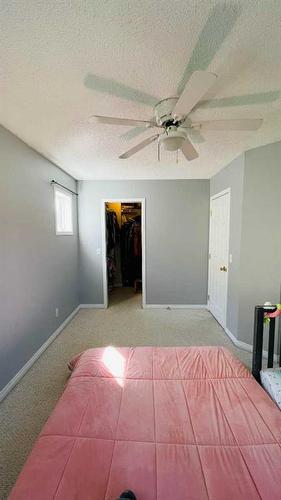 121 Hidden Valley Villas Nw, Calgary, AB - Indoor Photo Showing Bedroom