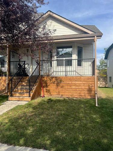 121 Hidden Valley Villas Nw, Calgary, AB - Outdoor With Deck Patio Veranda