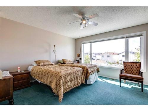 235 Arbour Wood Close Nw, Calgary, AB - Indoor Photo Showing Bedroom