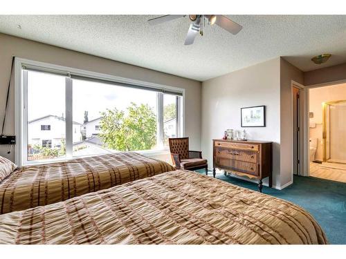 235 Arbour Wood Close Nw, Calgary, AB - Indoor Photo Showing Bedroom