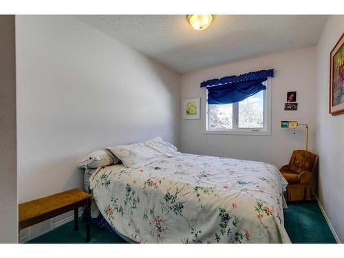 235 Arbour Wood Close Nw, Calgary, AB - Indoor Photo Showing Bedroom