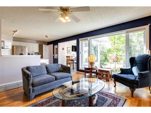 235 Arbour Wood Close Nw, Calgary, AB - Indoor Photo Showing Living Room