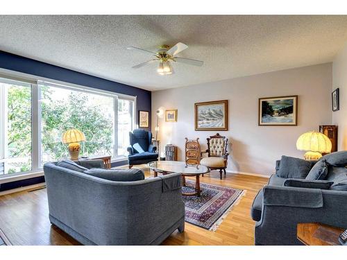 235 Arbour Wood Close Nw, Calgary, AB - Indoor Photo Showing Living Room