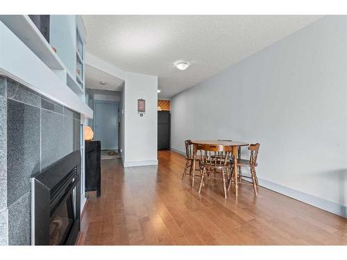 103-333 5 Avenue Ne, Calgary, AB - Indoor With Fireplace