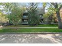 103-333 5 Avenue Ne, Calgary, AB  - Outdoor With Balcony With Facade 