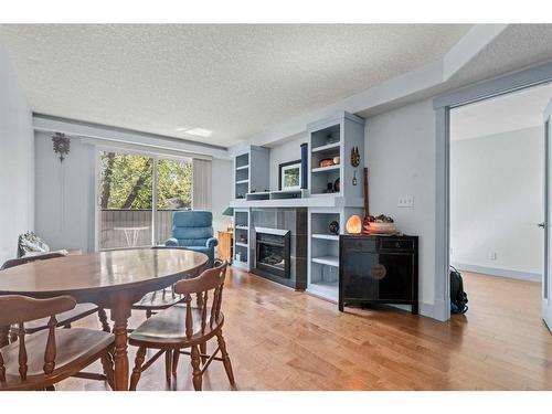 103-333 5 Avenue Ne, Calgary, AB - Indoor With Fireplace