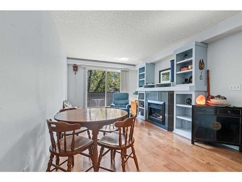 103-333 5 Avenue Ne, Calgary, AB - Indoor With Fireplace