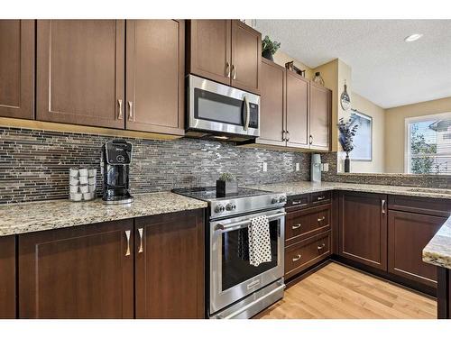 272 Kingsmere Cove Se, Airdrie, AB - Indoor Photo Showing Kitchen With Upgraded Kitchen