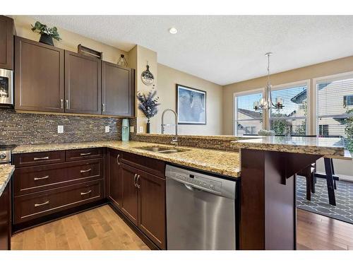 272 Kingsmere Cove Se, Airdrie, AB - Indoor Photo Showing Kitchen With Double Sink With Upgraded Kitchen