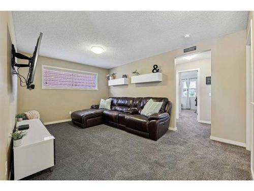 272 Kingsmere Cove Se, Airdrie, AB - Indoor Photo Showing Basement