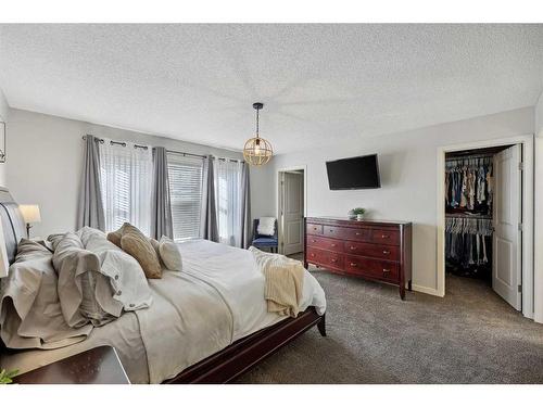 272 Kingsmere Cove Se, Airdrie, AB - Indoor Photo Showing Bedroom