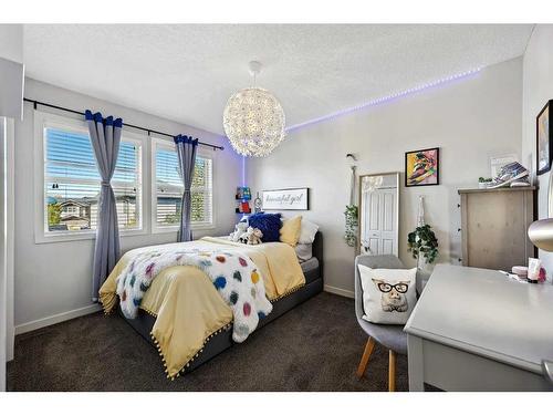 272 Kingsmere Cove Se, Airdrie, AB - Indoor Photo Showing Bedroom