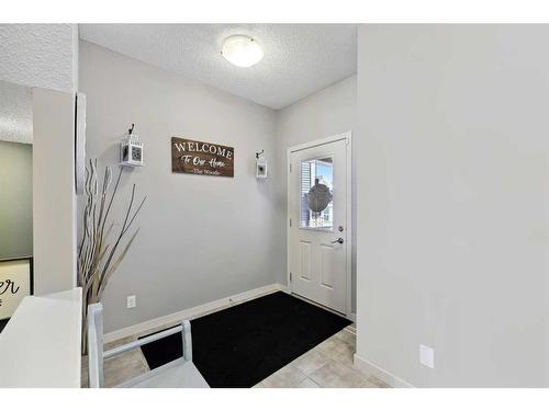 272 Kingsmere Cove Se, Airdrie, AB - Indoor Photo Showing Other Room