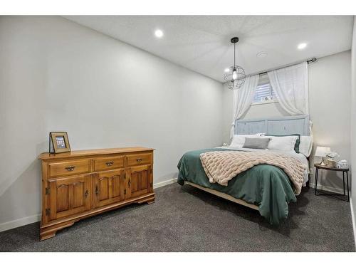 272 Kingsmere Cove Se, Airdrie, AB - Indoor Photo Showing Bedroom