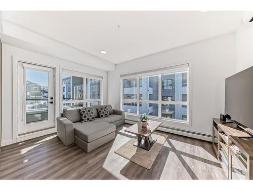 2315-350 Livingston Common Ne, Calgary, AB - Indoor Photo Showing Living Room