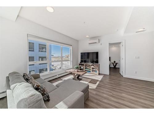 2315-350 Livingston Common Ne, Calgary, AB - Indoor Photo Showing Living Room