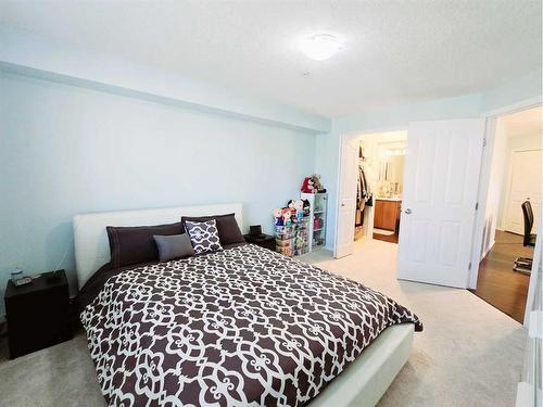 1301-60 Panatella Street Nw, Calgary, AB - Indoor Photo Showing Bedroom