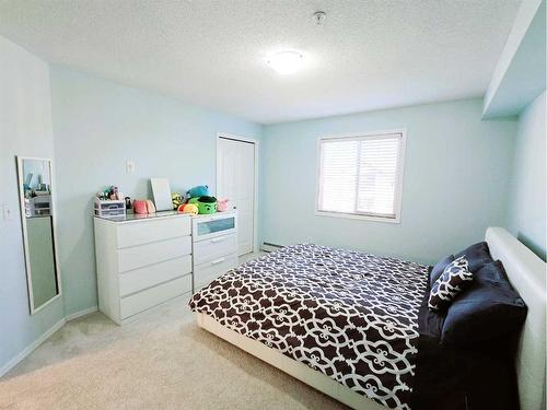 1301-60 Panatella Street Nw, Calgary, AB - Indoor Photo Showing Bedroom