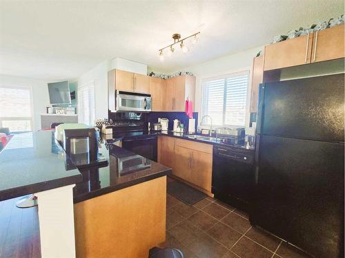 1301-60 Panatella Street Nw, Calgary, AB - Indoor Photo Showing Kitchen With Double Sink