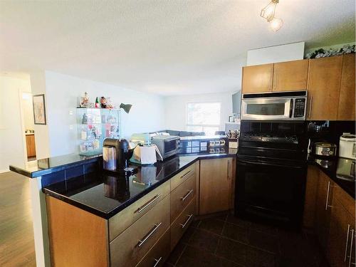 1301-60 Panatella Street Nw, Calgary, AB - Indoor Photo Showing Kitchen