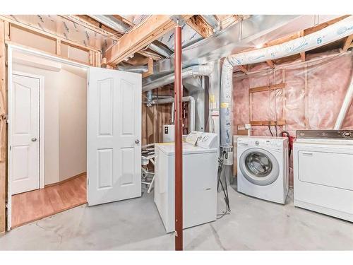 42 Somerside Place Sw, Calgary, AB - Indoor Photo Showing Laundry Room