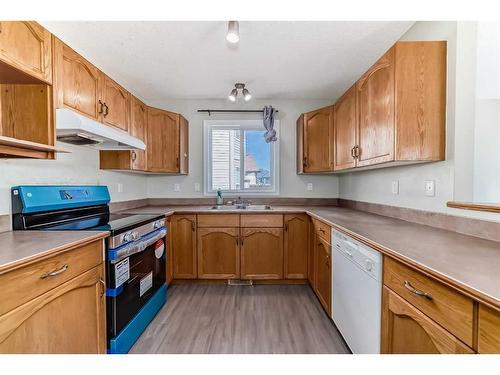 42 Somerside Place Sw, Calgary, AB - Indoor Photo Showing Kitchen With Double Sink