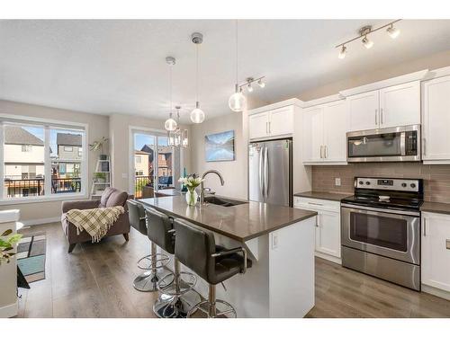 23 Cranbrook Gardens Se, Calgary, AB - Indoor Photo Showing Kitchen With Stainless Steel Kitchen With Upgraded Kitchen