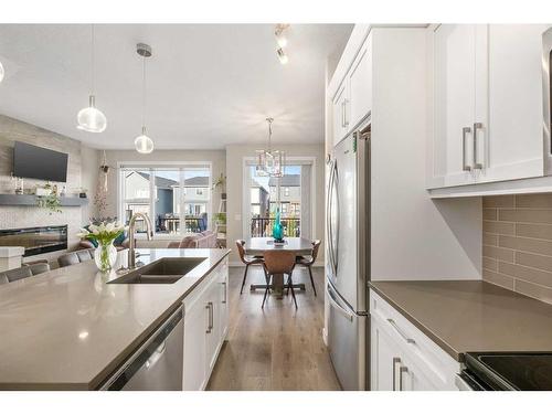 23 Cranbrook Gardens Se, Calgary, AB - Indoor Photo Showing Kitchen With Stainless Steel Kitchen With Double Sink With Upgraded Kitchen