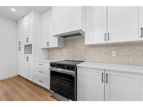 1372 South Point Parade Sw, Airdrie, AB - Indoor Photo Showing Kitchen