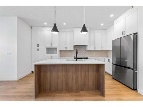 1372 South Point Parade Sw, Airdrie, AB - Indoor Photo Showing Kitchen