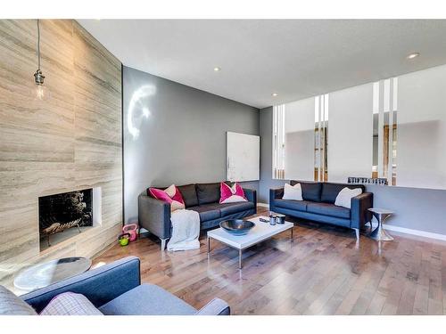 163 Oakmount Road Sw, Calgary, AB - Indoor Photo Showing Living Room With Fireplace