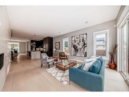 615 19 Avenue Nw, Calgary, AB - Indoor Photo Showing Living Room With Fireplace