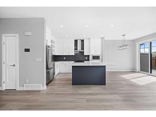 279 Greenwich Drive, Calgary, AB - Indoor Photo Showing Kitchen With Upgraded Kitchen