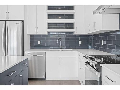 279 Greenwich Drive Nw, Calgary, AB - Indoor Photo Showing Kitchen With Stainless Steel Kitchen With Upgraded Kitchen