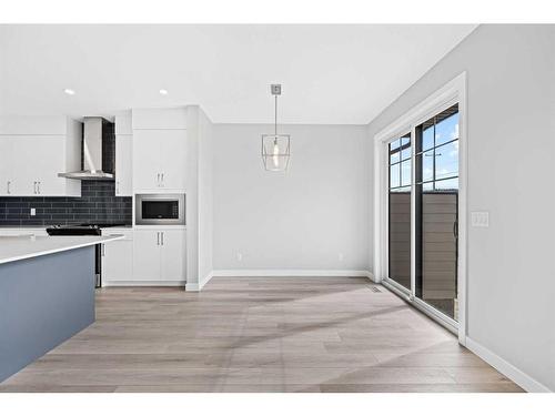 279 Greenwich Drive Nw, Calgary, AB - Indoor Photo Showing Kitchen With Upgraded Kitchen