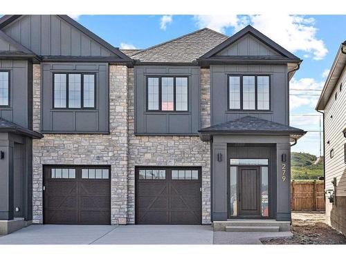 279 Greenwich Drive, Calgary, AB - Outdoor With Facade