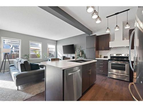 1523 New Brighton Drive Se, Calgary, AB - Indoor Photo Showing Kitchen With Double Sink