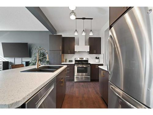 1523 New Brighton Drive Se, Calgary, AB - Indoor Photo Showing Kitchen With Double Sink With Upgraded Kitchen