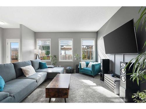 1523 New Brighton Drive Se, Calgary, AB - Indoor Photo Showing Living Room