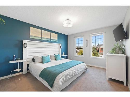 1523 New Brighton Drive Se, Calgary, AB - Indoor Photo Showing Bedroom